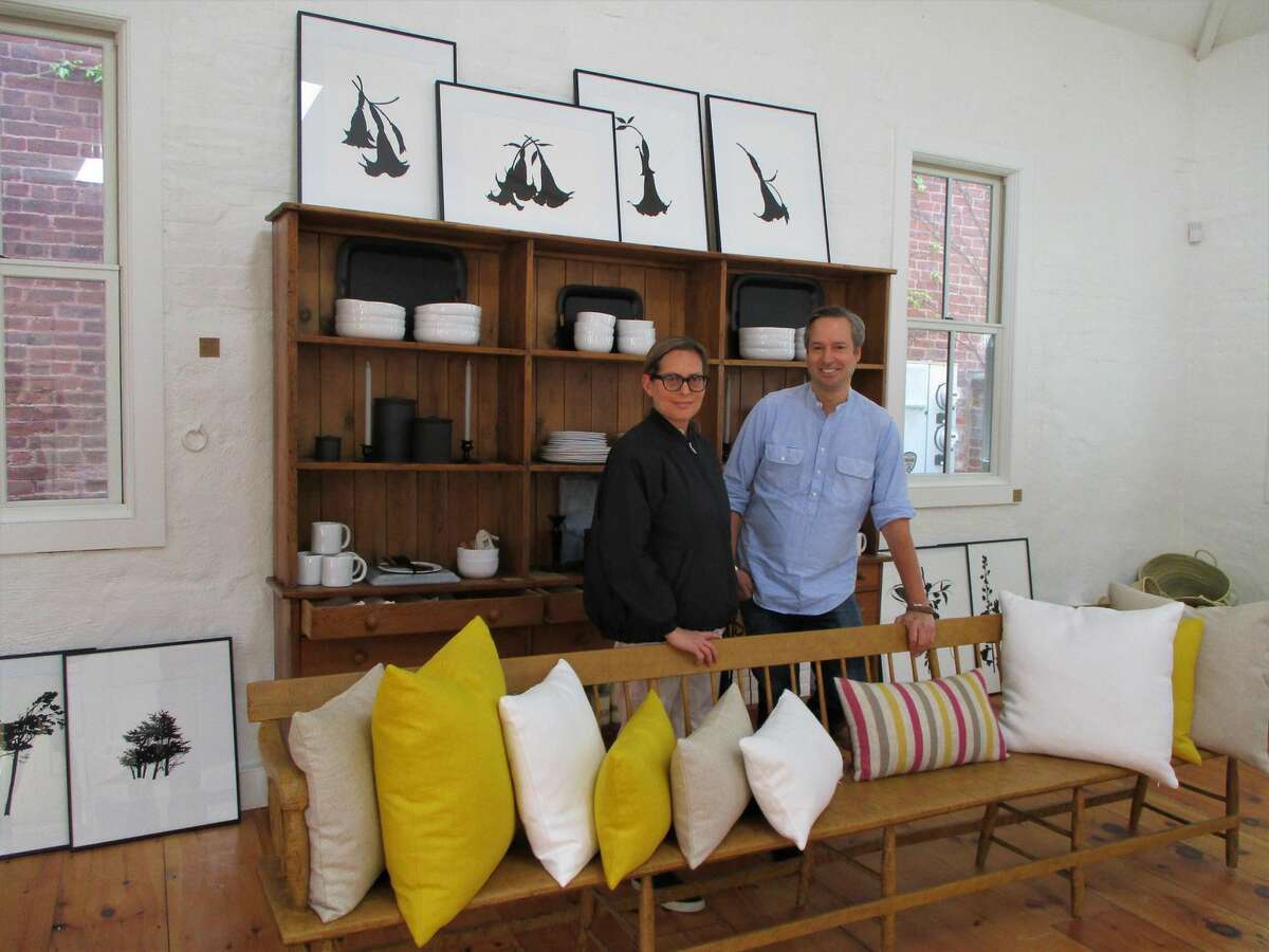 Milton Market partners Marsha Fish and Gerardo Figueroa get comfortable in their chic shop in Cobble Court.