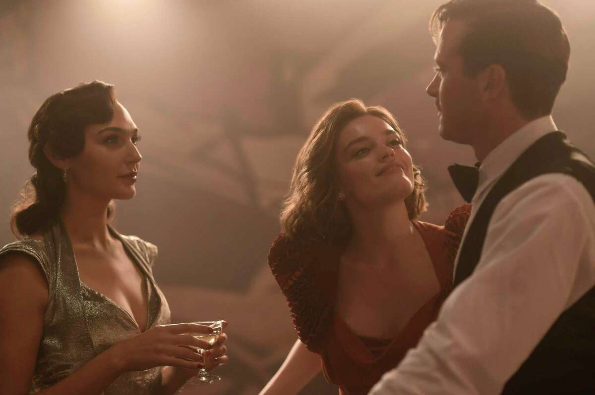 From left, Gal Gadot, Emma Mackey and Armie Hammer in “Death on the Nile.”