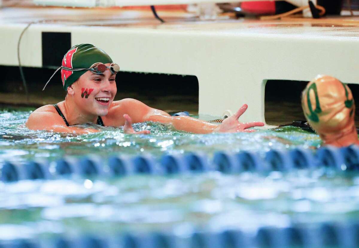 Liv Garriss of The Woodlands reacts after competing in the girls 50-yard freestyle during the Region IV-6A Swimming & Diving Championships, Saturday, Feb. 5, 2022, in Shenandoah.