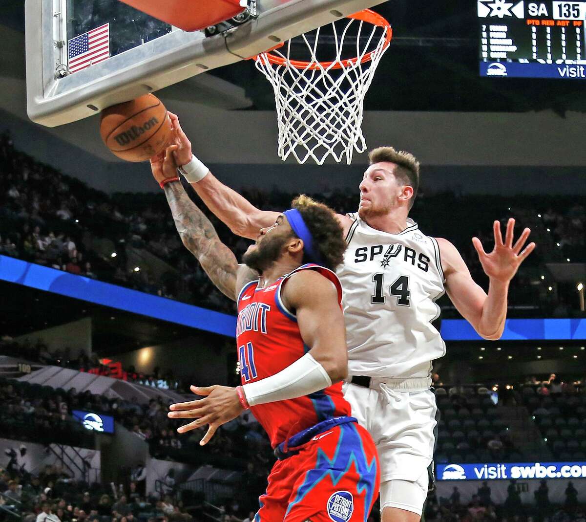 San Antonio Spurs forward Drew Eubanks #14 blocks shot of Detroit Pistons forward Saddiq Bey #41 in second half. Spurs-Pistons on Sunday, Dec. 26, 2021