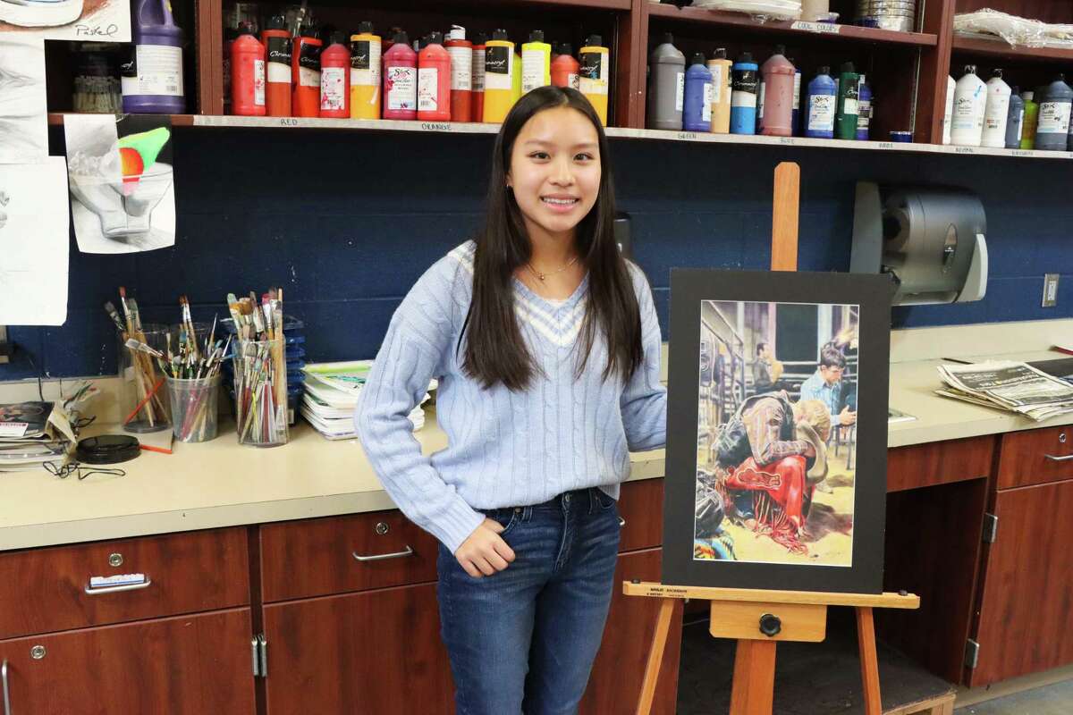 Dawson High School junior Gracin Nguyen says her drawing, “In His Hands,” which won the grand prize in this year's Houston Livestock Show and Rodeo, shows a prayerful moment before cowboys begin bull riding.