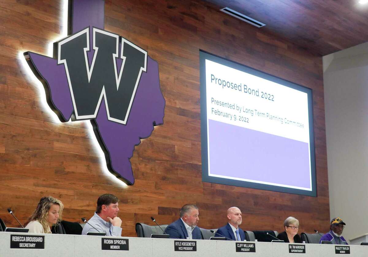 Members of the Willis ISD school board listen to a presentation by the Willis ISD bond committee during a Willis ISD board meeting, Wednesday, Feb. 10, 2022, in Willis.