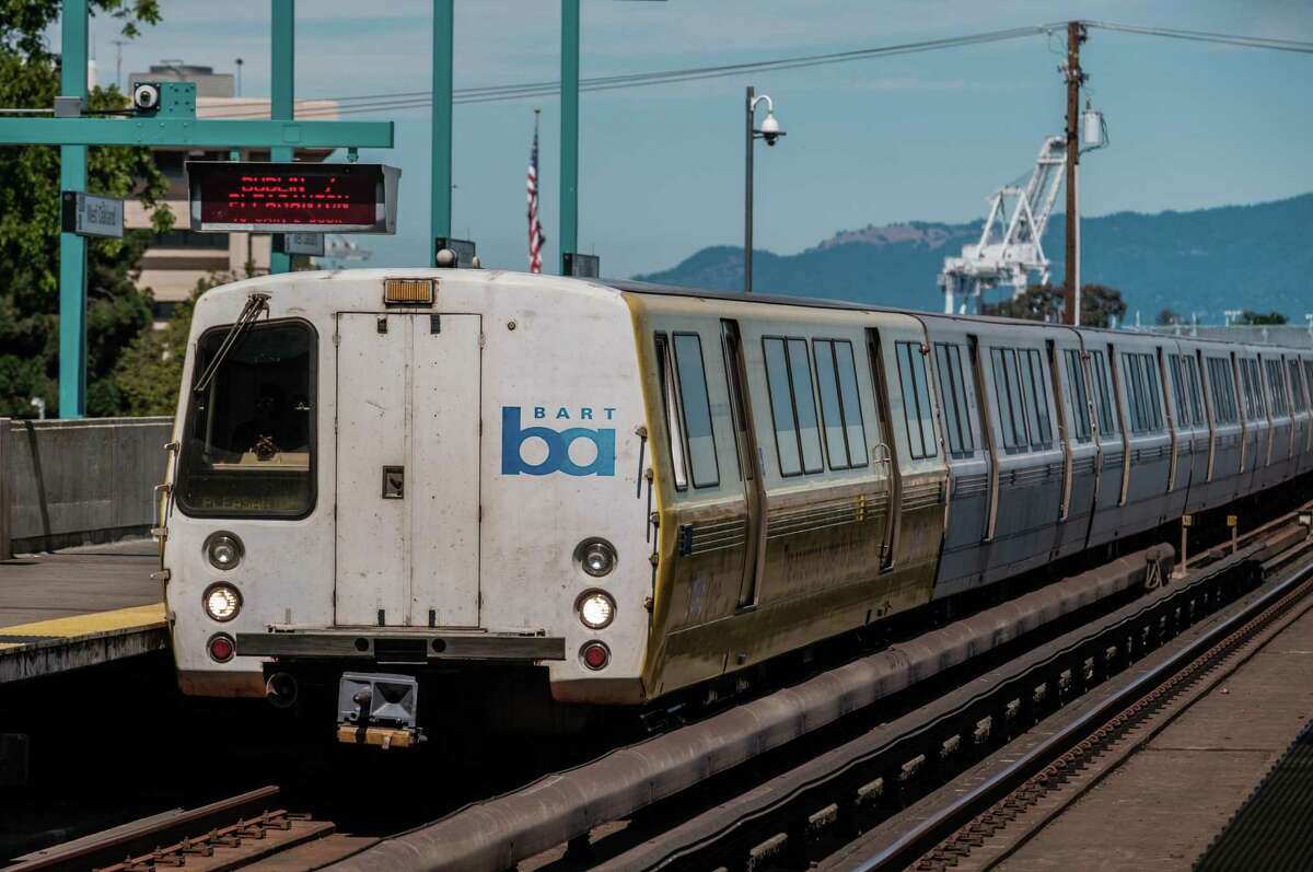 A train is seen pulling into the West Oakland BART Station in Oakland in August 2021. BART is facing massive revenue shortfalls as ridership numbers continue to be slow to recover.