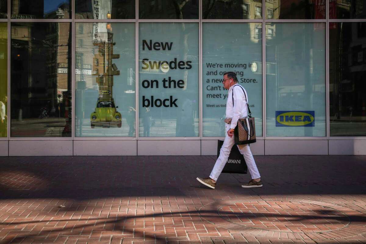 A pedestrian walks by 945 Market Street where IKEA is planning to open on Thursday, Feb. 10, 2022, in San Francisco, Calif.