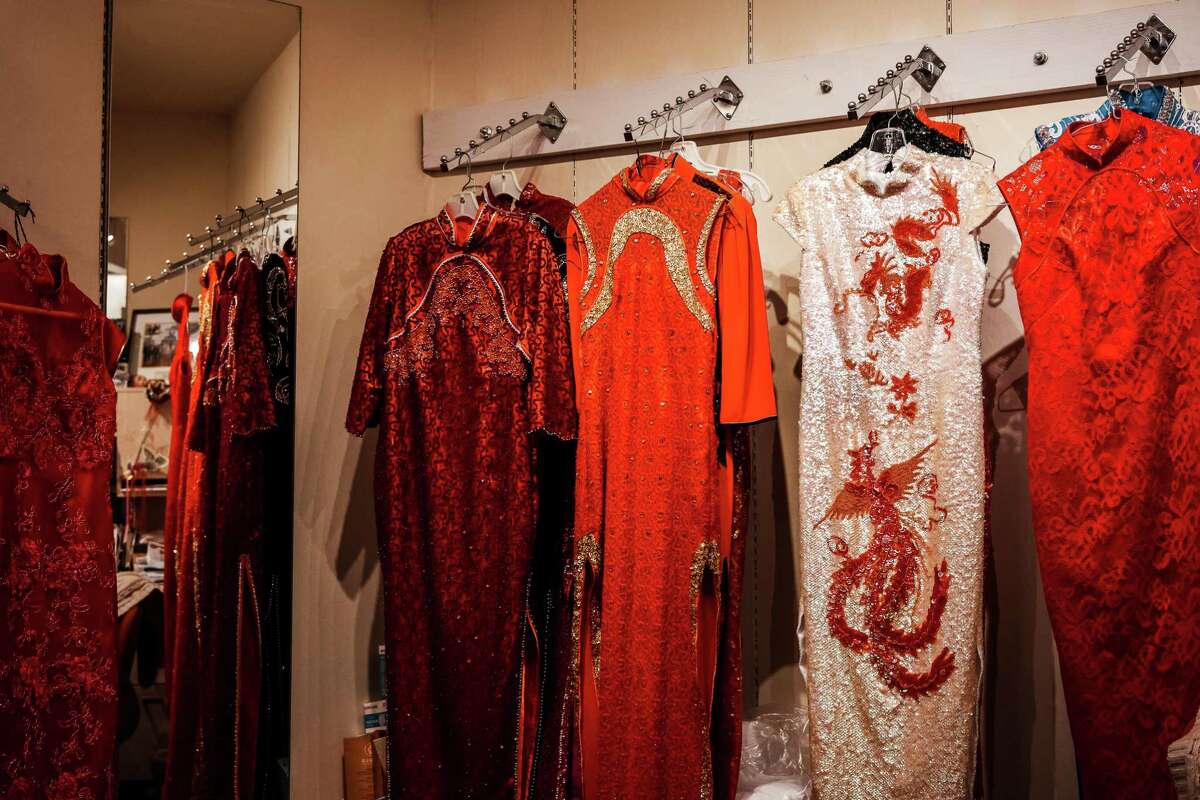 Cheongsams for sale and rent hang in Dragon Seed dress shop in San Francisco’s Chinatown.