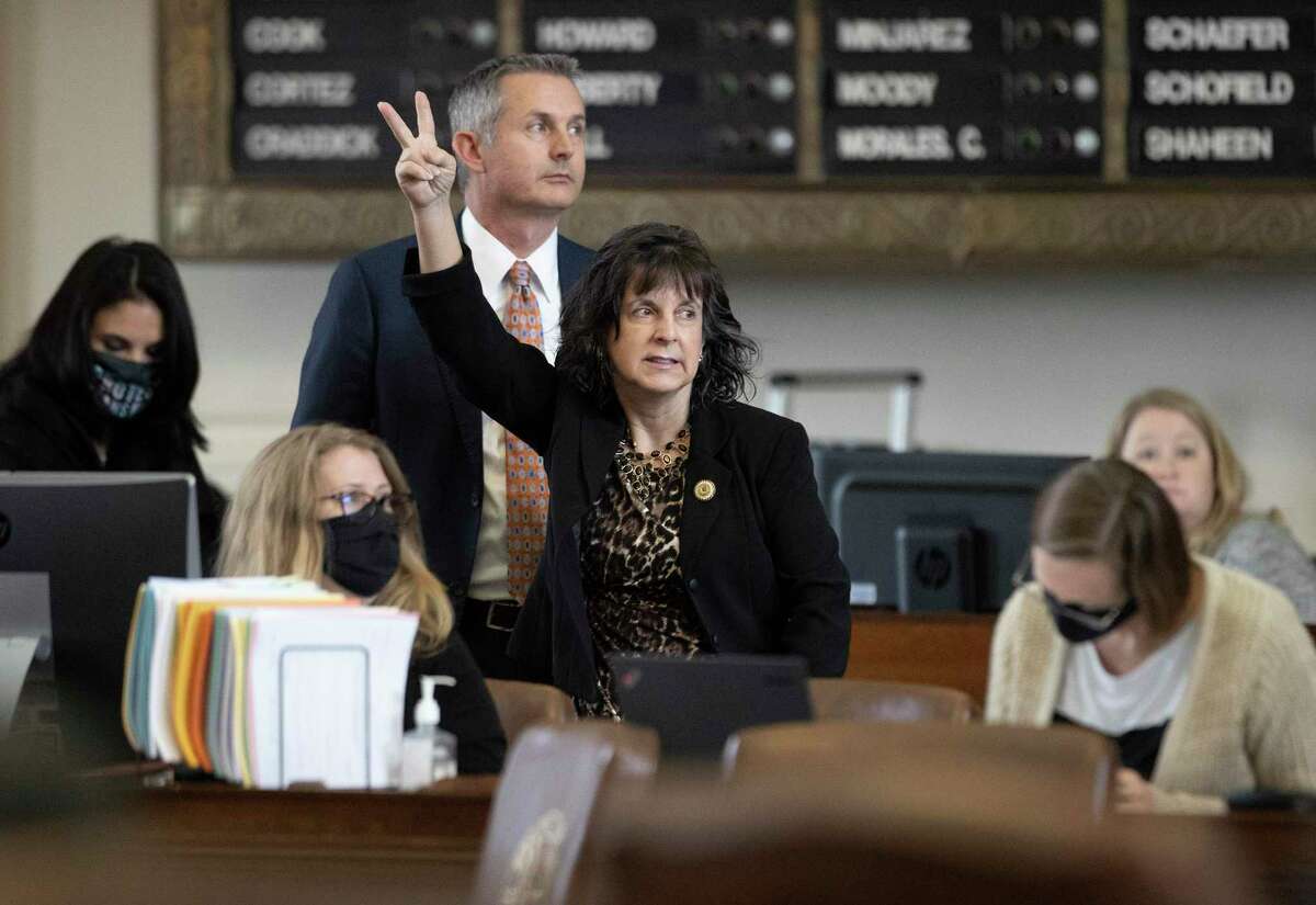 Stat Rep. Valoree Swanson, R-Spring, votes against an amendment to House Bill 25, which she authored, that limits the participation of transgender athletes in public school sports, in the House Chamber at the Capitol in Austin, Texas, on Thursday Oct. 14, 2021. (Jay Janner /Austin American-Statesman via AP)