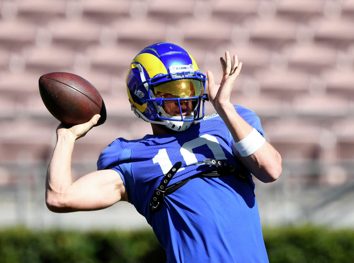 Wide receiver Cooper Kupp of the Los Angeles Rams throws a pass during practice in preparation for the Super Bowl LVI at the Rose Bowl Stadium on February 10, 2022 in Pasadena, California.
