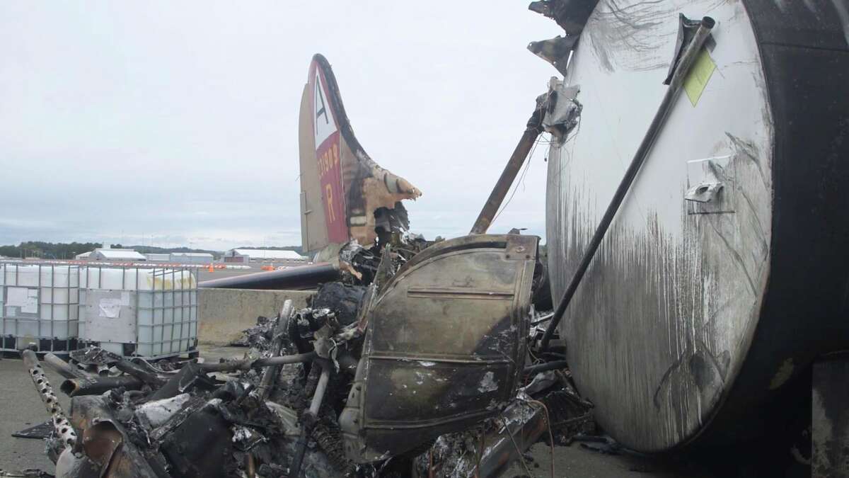 This image taken from video provided by National Transportation Safety Board shows damage from a World War II-era B-17 bomber plane that crashed at Bradley International Airport in October. Efforts to fight the resulting fire led to the discharge of PFAS chemicals into the environment.