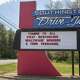 In this May 12, 2020, photo, the Southington Drive-In displays a message to first responders, health care workers and town personnel as an ambulance heads to a call on Meriden Waterbury Turnpike in Southington.