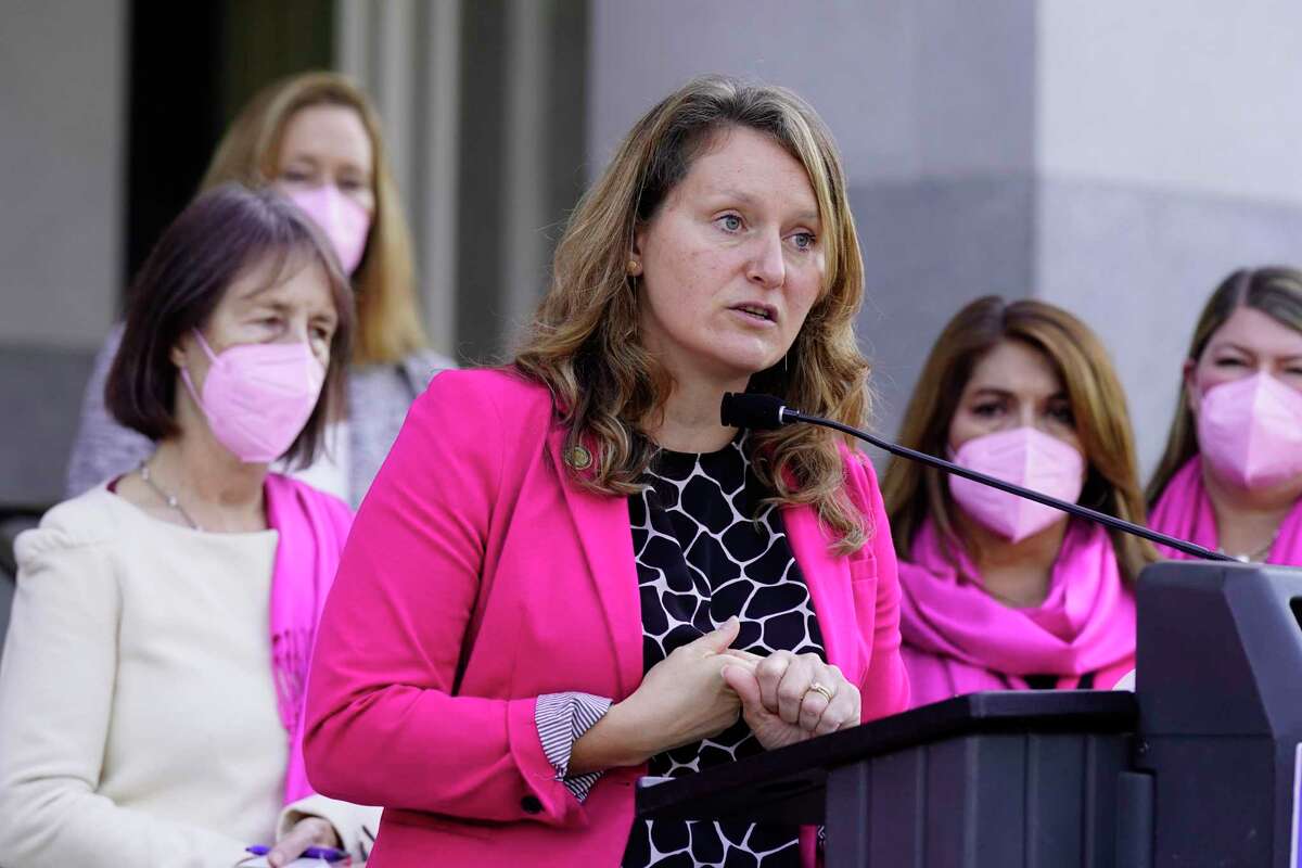 Assemblywoman Buffy Wicks, D-Oakland, is flanked by other members of the Legislative Women's Caucus as she discusses efforts to strengthen women's reproductive rights at the Capitol in Sacramento, Calif., on Jan. 20, 2022.