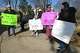 Several dozen people turned out for a rally in front of The Catholic Center, in Bridgeport, Conn. Feb. 11, 2022. The rally was organized to show support following a recent decision for area Catholic schools to go mask-optional at the end of the month.