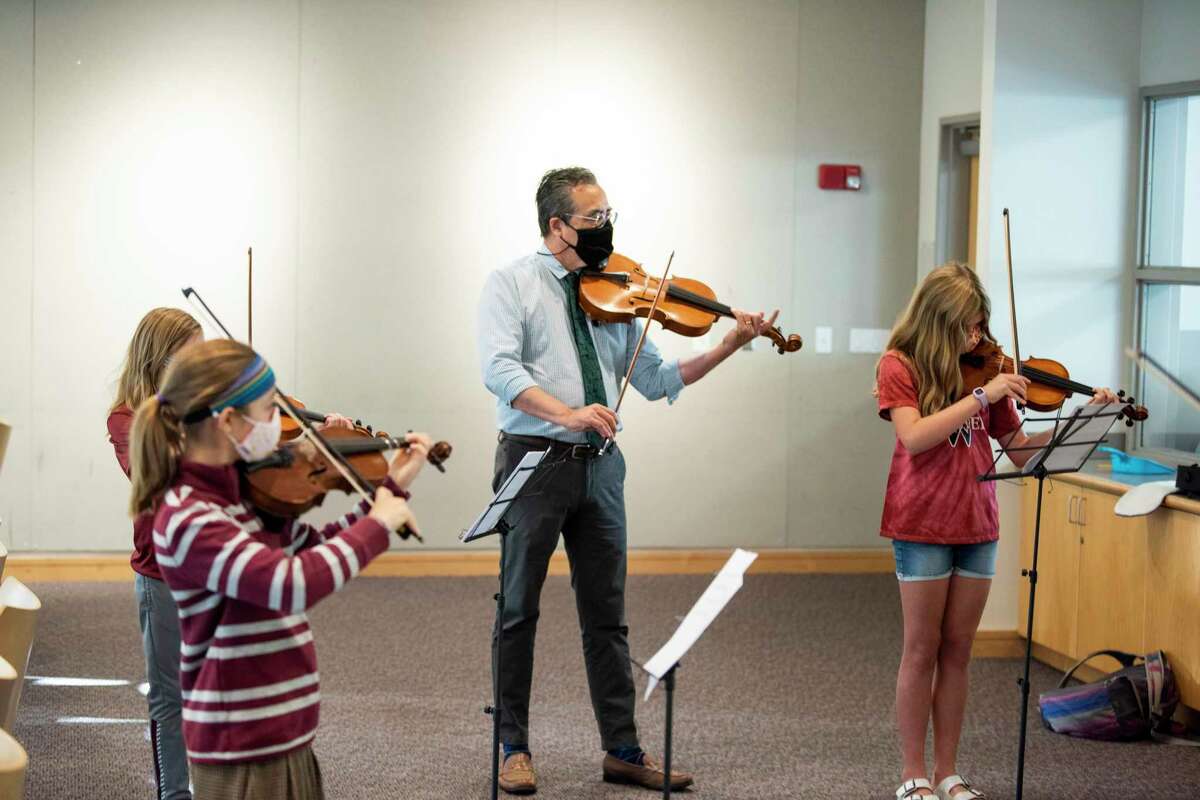 Mr. Mac Johnson with a group of Middle School musicians. Wooster School in Danbury has established a fellowship program to attract and retain teachers of color. The fellows would teach at Wooster for two years, while having the opportunity to earn their master’s degree through Mount Holyoke College.