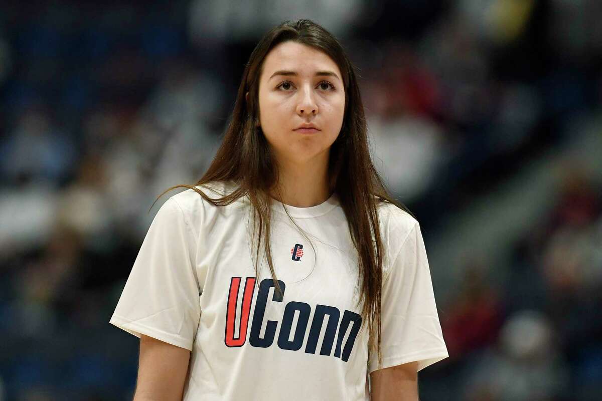 UConn’s Caroline Ducharme watches her team warm up before a game against Tennessee in February.