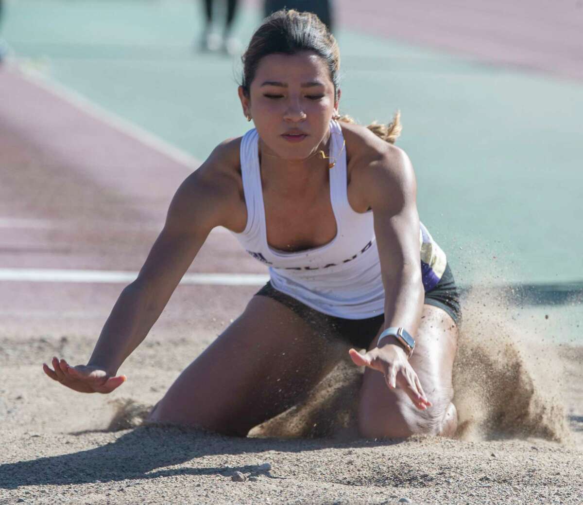 Midland High's Taylor Gonzalez competes in the girls long jump 02/11/2022 during the Tall City Relays at Memorial Stadium. Tim Fischer/Reporter-Telegram