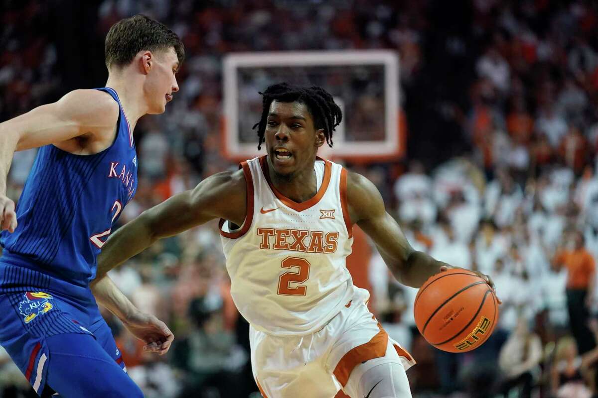 Marcus Carr, right, and Texas found a newfound swagger in Monday’s upset victory over Christian Braun and Kansas.