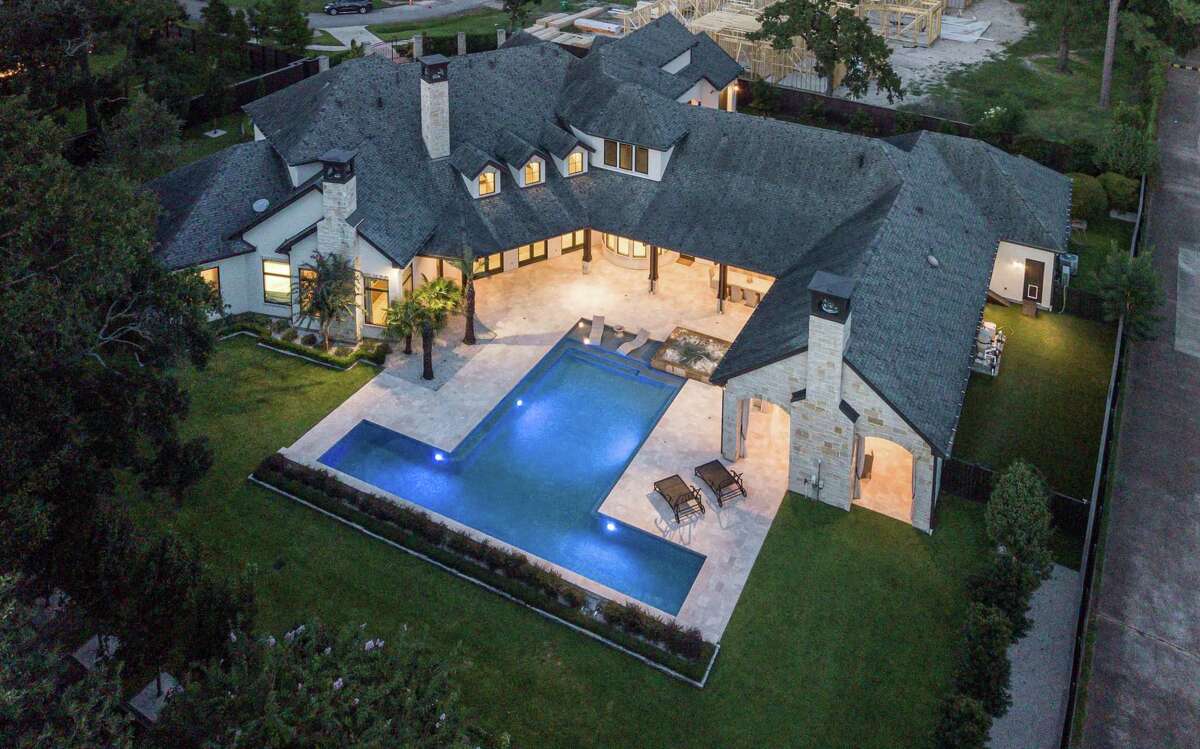 Shortly after buying the home, Watt installed a swimming pool shaped like a “T” for Texans.