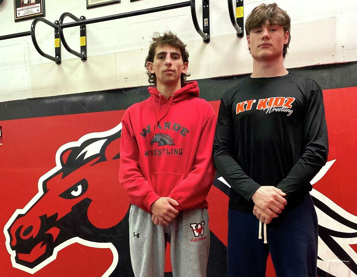 Warde senior wrestling captains Jeremy Brault and Will Ebert in the Mustangs wrestling room.