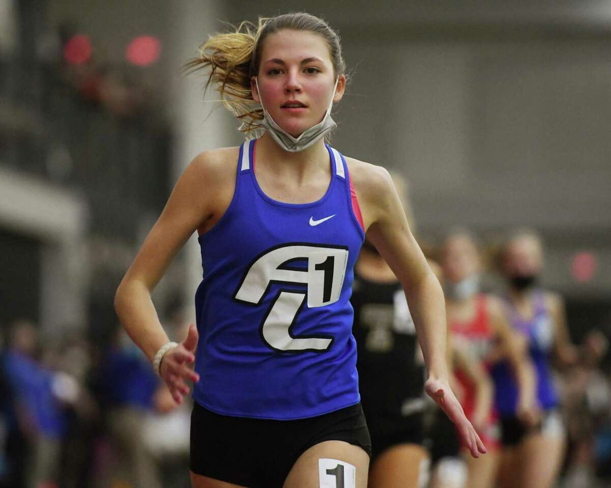 Ludlowe’s Anna Keeley races to victory in the 1,600 meters at the Class LL Track Championships at the Floyd Little Athletic Center in New Haven on Friday.