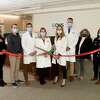 Orthopaedic & Neurosurgery Specialists has announced the opening of its Wilton medical office, and physical therapy center at the Wilton Wellness Center, located at 249 Danbury Road in Wilton, with a ribbon cutting ceremony with the Wilton Chamber of Commerce. Pictured from the left to the right are: Wilton Chamber of Commerce executive director Camille Carriero, Carol Johnson, Wilton Chamber of Commerce head of programming, and events, Dr. Hobson, Orthopaedic & Neurosurgery Specialists Chief Clinical Officer Katie Vadasdi, M.D., and Wilton Chamber President Susan Goldman.