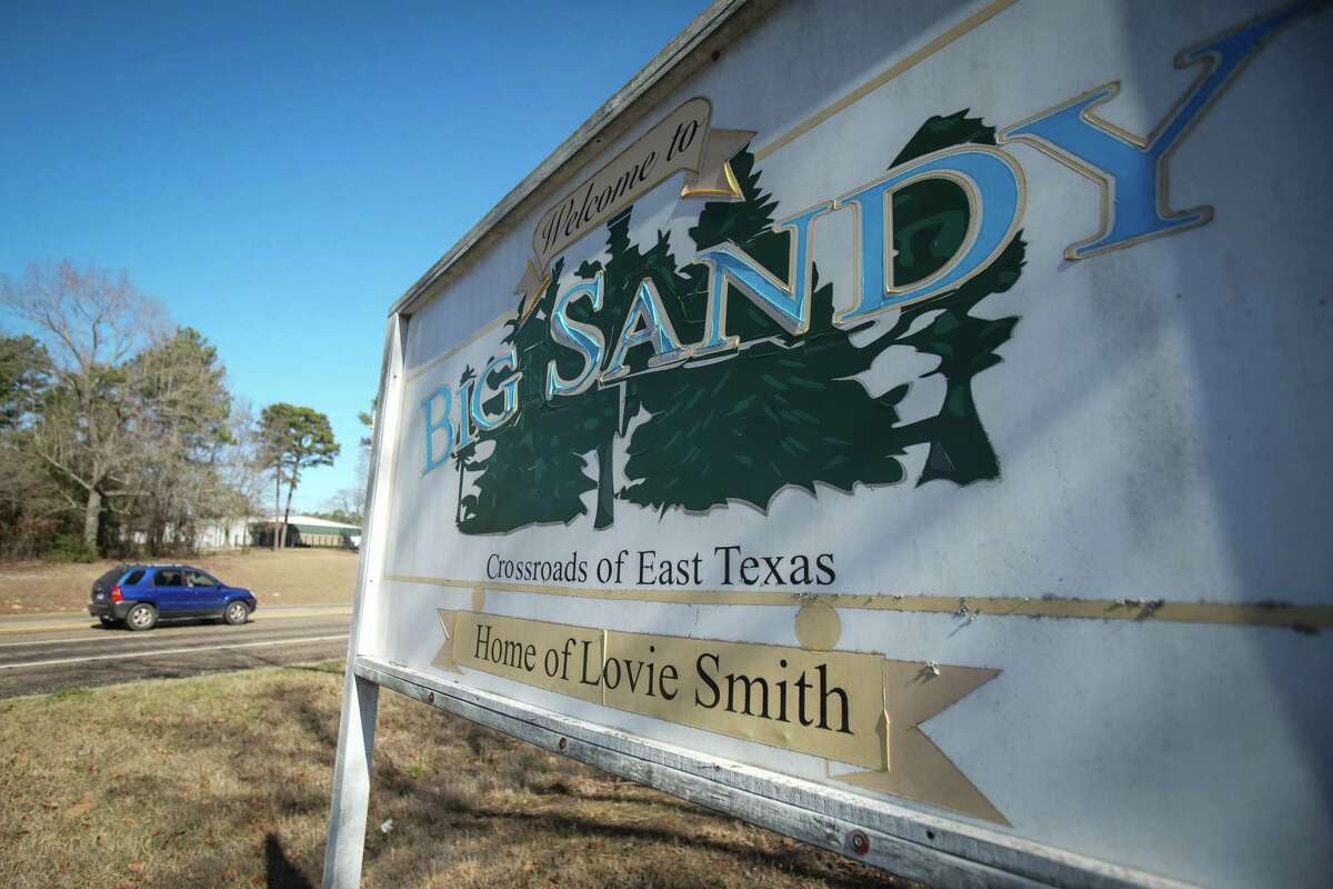 Cars drive past the Big Sandy town sign, that boasts as the home of Houston Texans head coach Lovie Smith, Wednesday, Feb. 9, 2022 in Big Sandy.