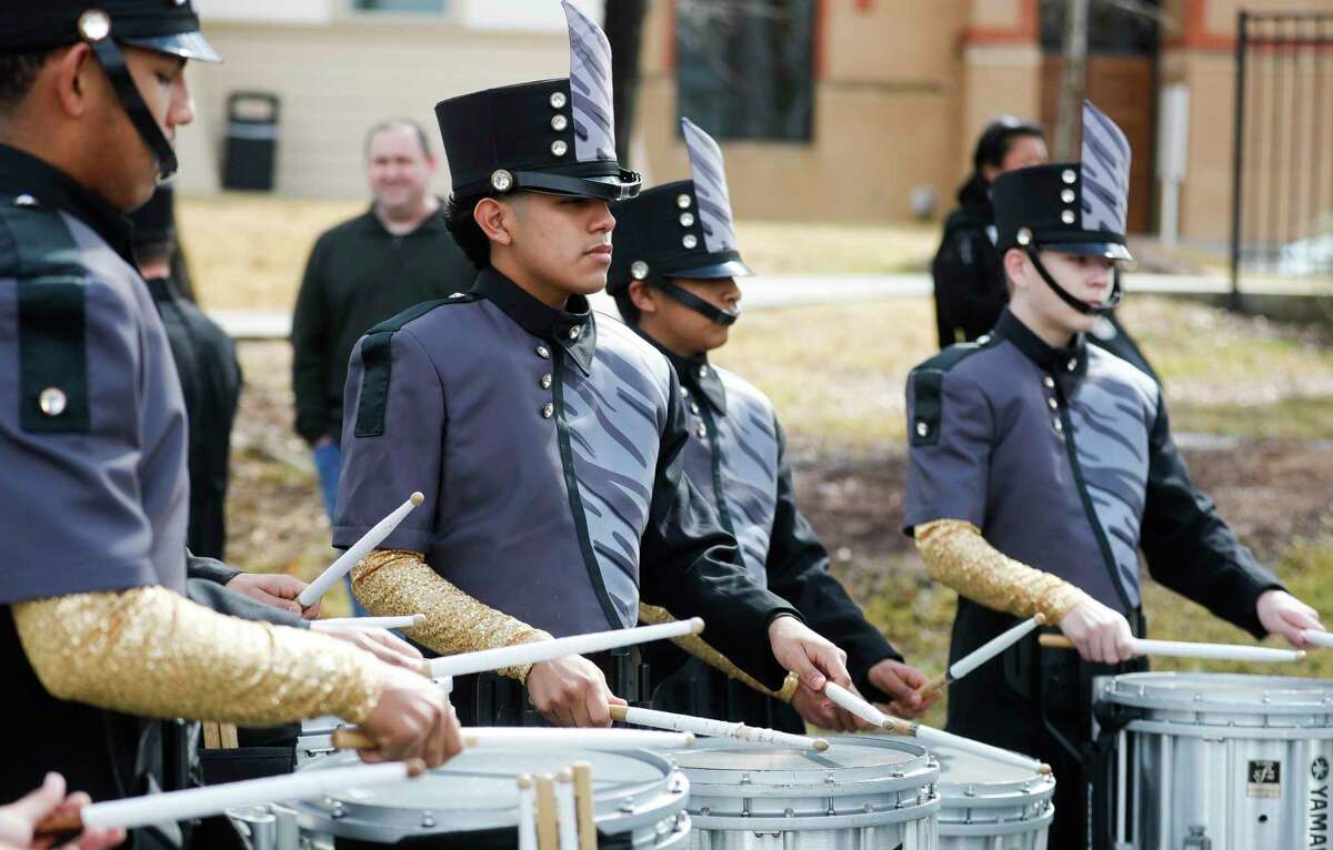 Members of the Conroe High School band warm up before Conroe’s annual Black History Month parade, Saturday, Feb. 12, 2022, in Conroe.