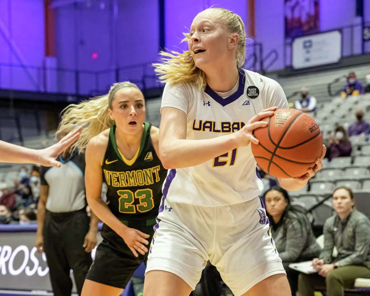 UAlbany junior Helene Haegerstrand makes a move in front of Vermont junior Emma Utterback, an America East first-team selection, during a matchup at SEFCU Arena on Saturday, Feb. 12, 2022. The Great Danes host the Catamounts again for a semifinal game on Tuesday.