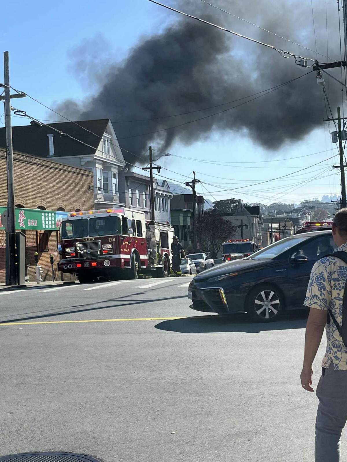 A three-alarm fire at 324 10th Avenue in San Francisco on the afternoon of Saturday, February 12, where the fire department was in the process of rescuing one victim.