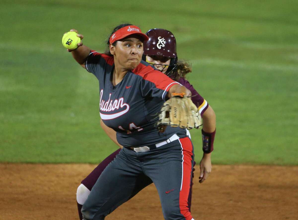 Judson Rockets junior Destiny Rodriguez (11) throws to first base after tagging out a runner at third during the Class 6A state softball championship game on Saturday, June 4, 2021 in Austin, Texas.