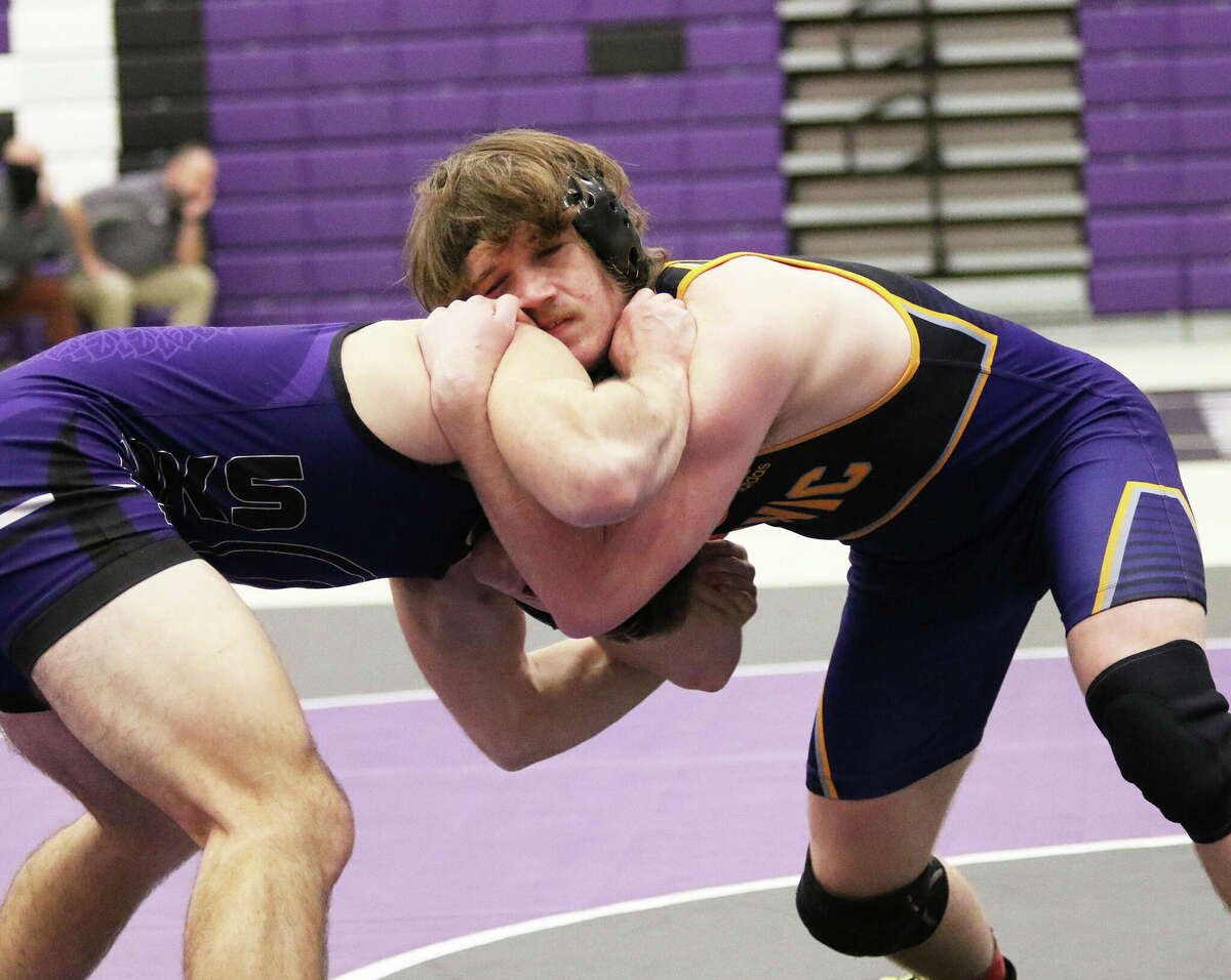 CM's Abe Wojcikiewicz (right), shown in a match earlier this season at the Mascoutah Invite, improved to 39-0 while winning the 170-pound title Saturday at the Mahomet-Seymour Class 2A Sectional.