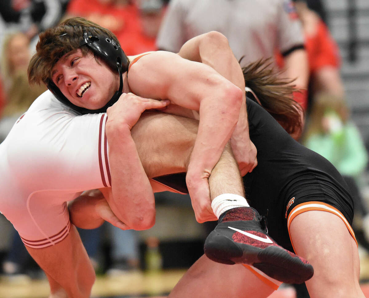 Edwardsville's Drew Landau with a takedown during his 145-pound match at the Granite City Sectional on Saturday in Granite City.