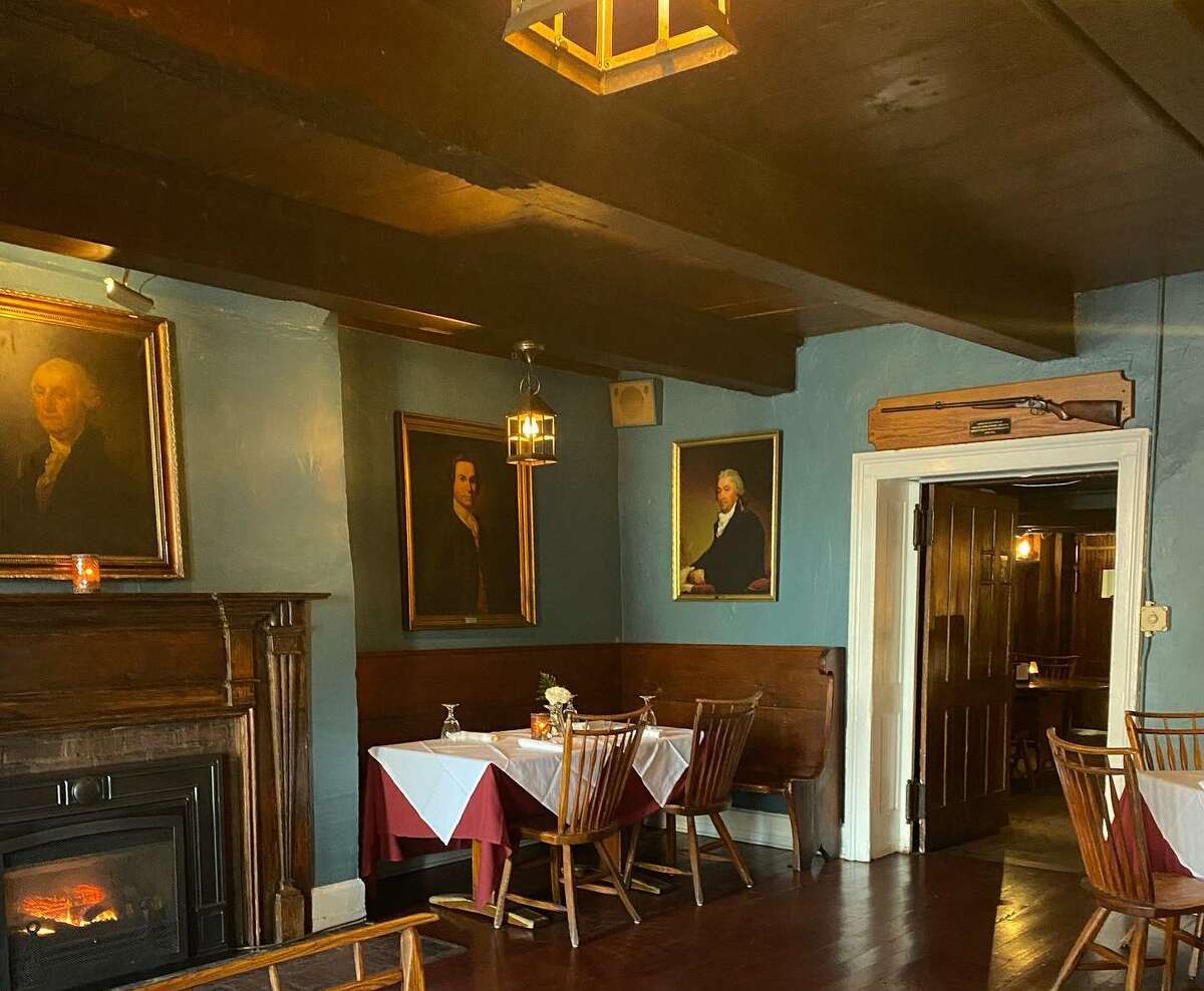 George Washington hangs above the hearth in the Portrait Room in Beekman Arms. He slept here in the 18th century when it was called the Bogardus Tavern.