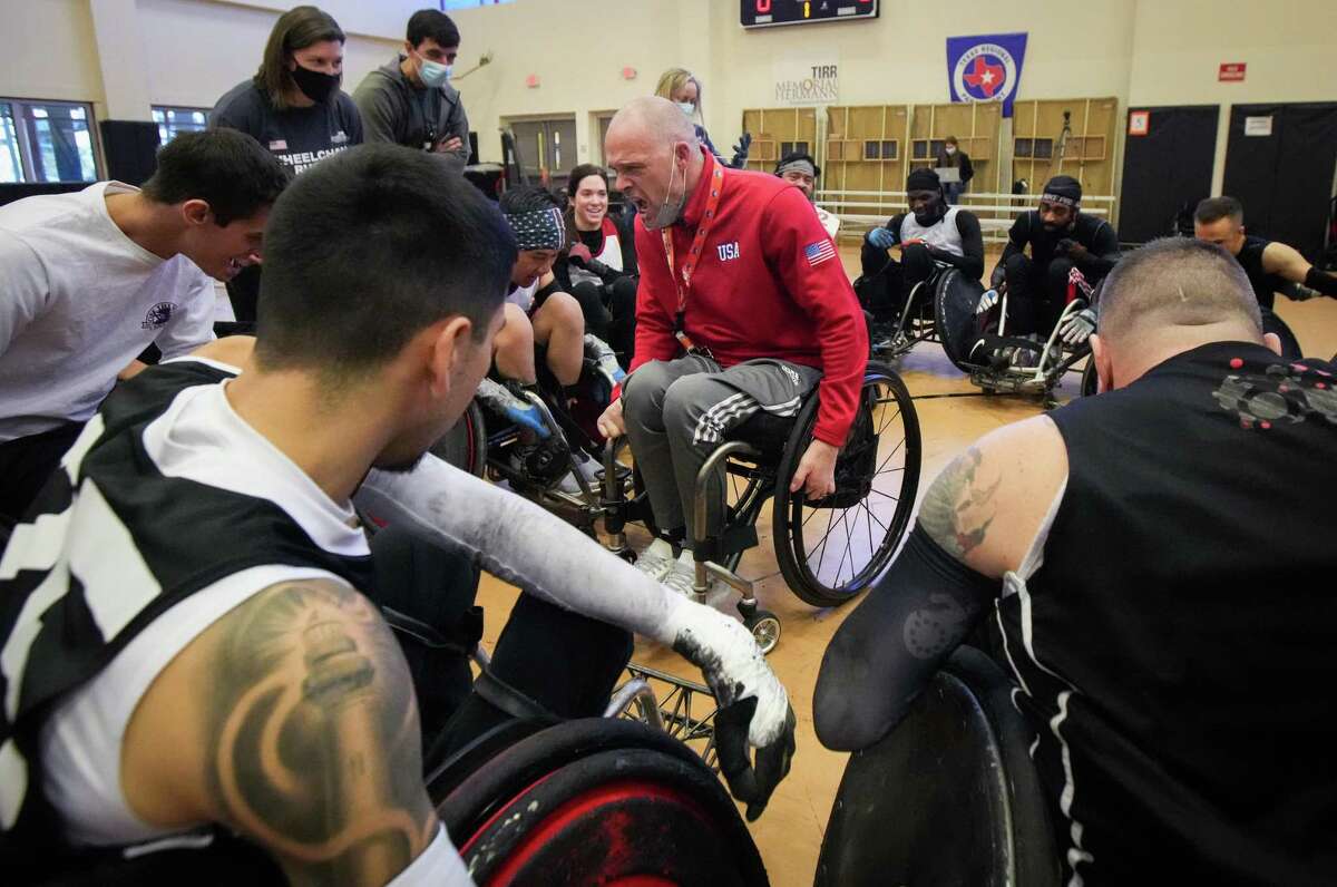 Steve Kearley, head coach of the inaugural United States Low-Point Wheelchair Rugby Team, leads a chant during team tryouts Sunday, Feb. 13, 2021, at the West Gray Adaptive Recreation Center in Houston.