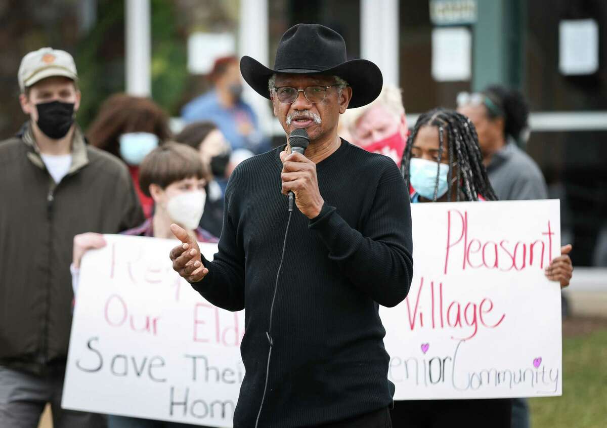 State Rep. Harold Dutton speaks during a protest against higher rent Saturday, Feb. 12, 2022, at the Pleasant Village Apartments in Houston. Advocates said many seniors who live on a fixed income at the complex cannot afford higher rents under the complex’s new owner.