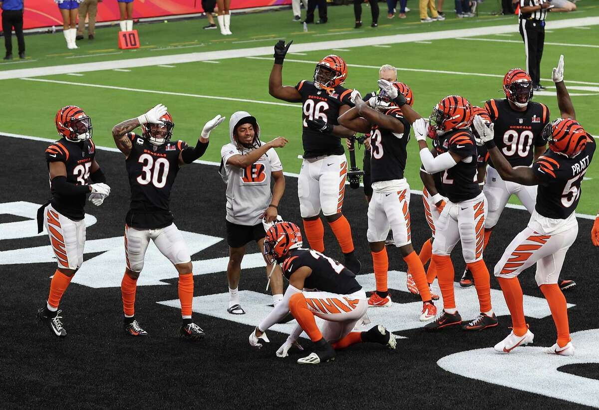 Vernon Hargreaves, in the gray hoodie, joins the Cincinnati Bengals celebration following an interception by Jessie Bates during the second quarter of Super Bowl LVI against the Los Angeles Rams at SoFi Stadium on February 13, 2022 in Inglewood, California.