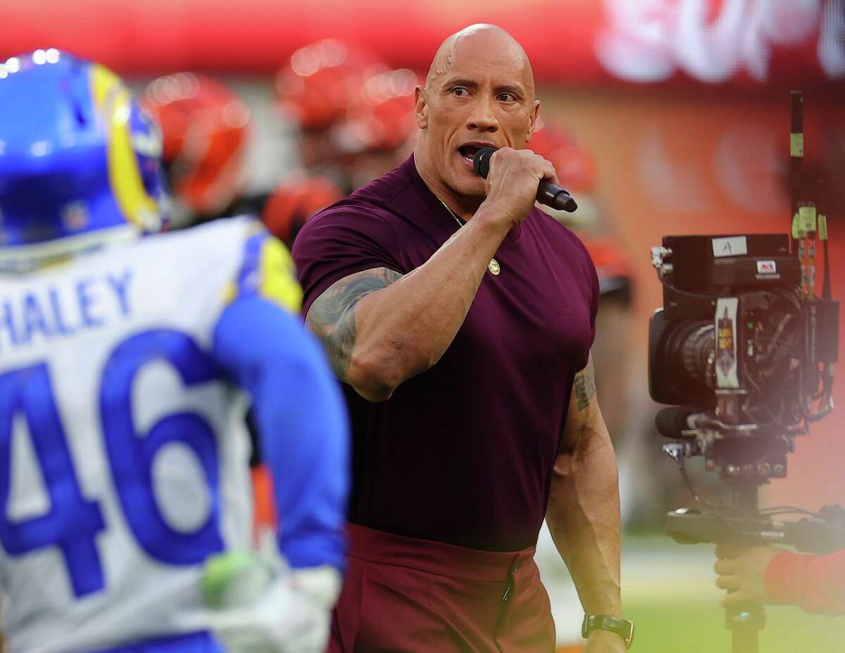 Entertainer Dwayne “the Rock” Johnson juices up the crowd in introductory ceremonies for Super Bowl LVI between the Los Angeles Rams and the Cincinnati Bengals at SoFi Stadium.