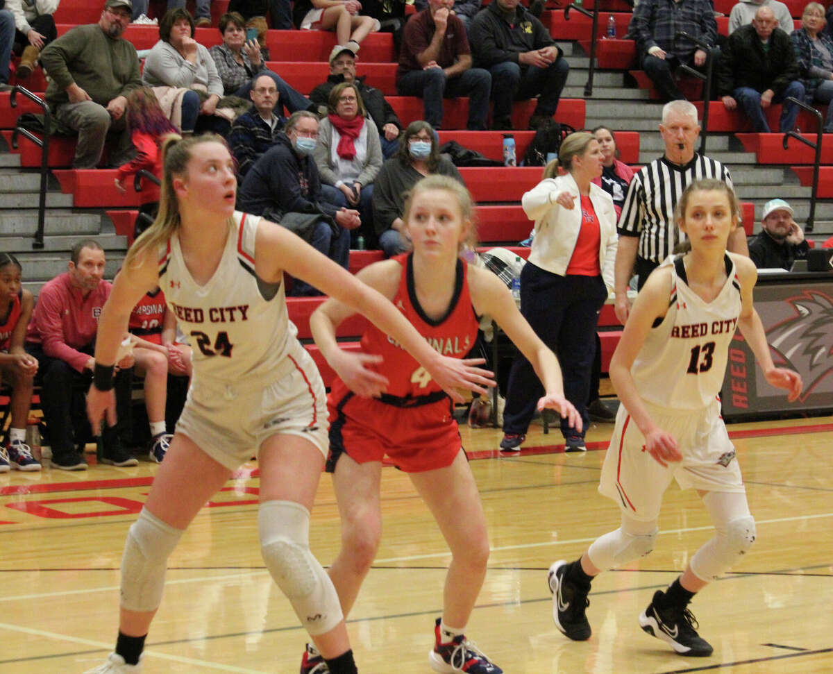 Christina Malackanich (24) gets set for a possible rebound in recent action.