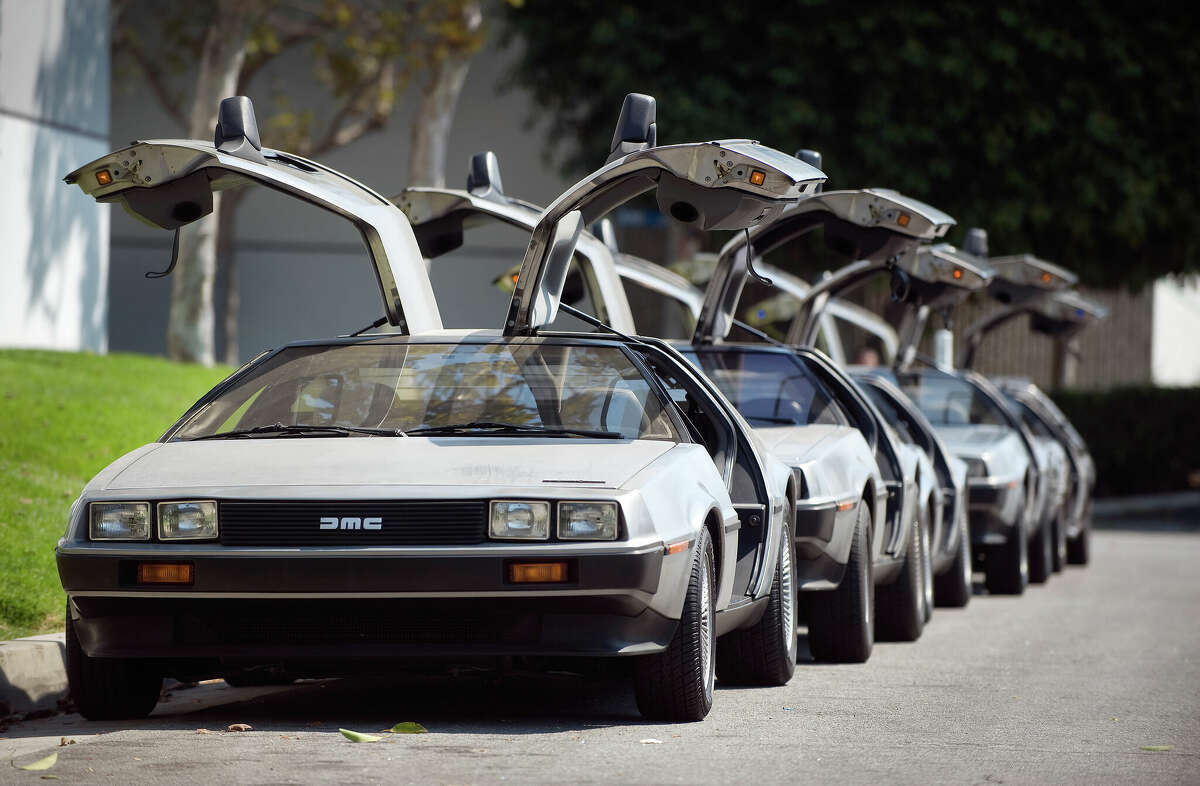 A row of DeLoreans sit outside the DeLorean Motor Company in Huntington Beach, CA, in 2013. The DeLorean plans to move into Port San Antonio and is expected to hire for 450 jobs.