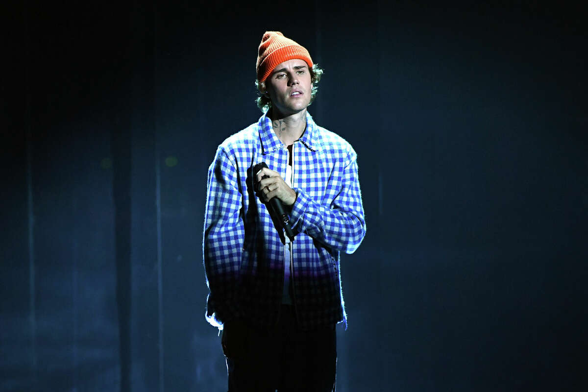 LOS ANGELES, CALIFORNIA - NOVEMBER 22: In this image released on November 22, Justin Bieber performs onstage for the 2020 American Music Awards at Microsoft Theater on November 22, 2020 in Los Angeles, California. (Photo by Kevin Mazur/AMA2020/Getty Images for dcp)