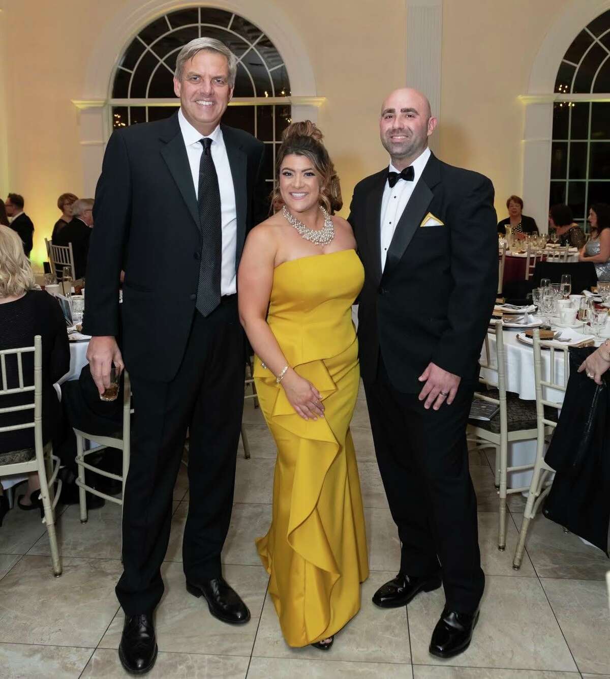New Britain Mayor Erin Stewart, center, at her 5th inaugural ball Saturday night, Feb. 12 at the Aqua Turf in Southington with Bob Stefanowski, left, the likely 2022 Republican nominee for governor and her husband, Domenic Mutone, right. Stewart uses the name Stewart-Mutone in her personal life but remains Stewart in politics.