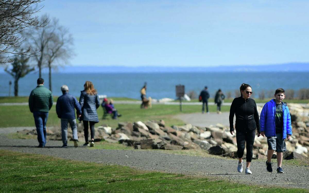 Visitors take adavantage of the nice weather Wednesday, April 1, 2020, at Sherwood Island State Park in Westport, Conn.