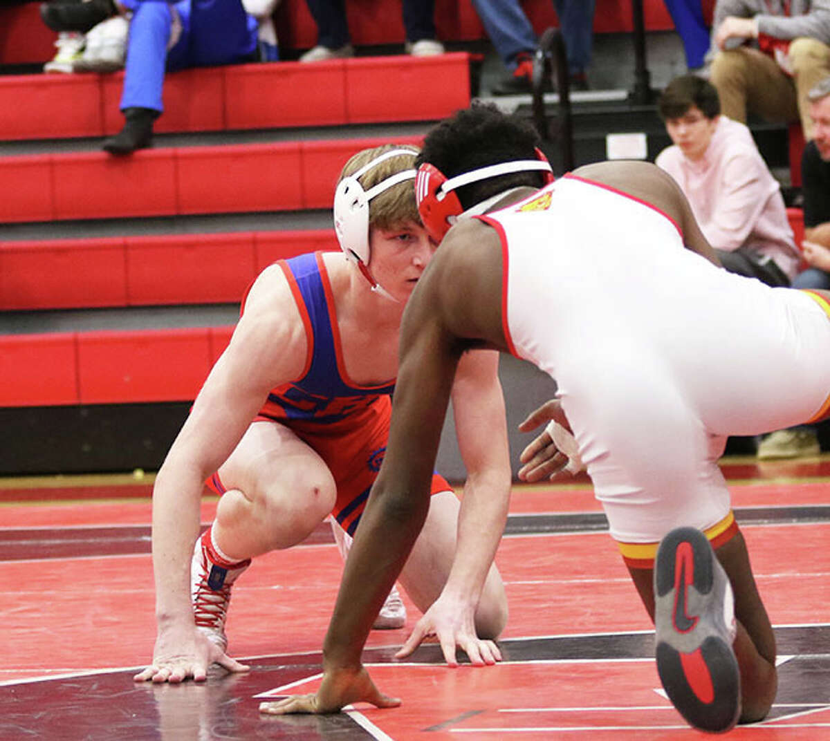 Carlinville's Jake Schwartz (left) will face Max Astacio of Marian Central Catholic in the prelims of the IHSA Class 1A State Wrestling Tourney Thursday in Champaign.