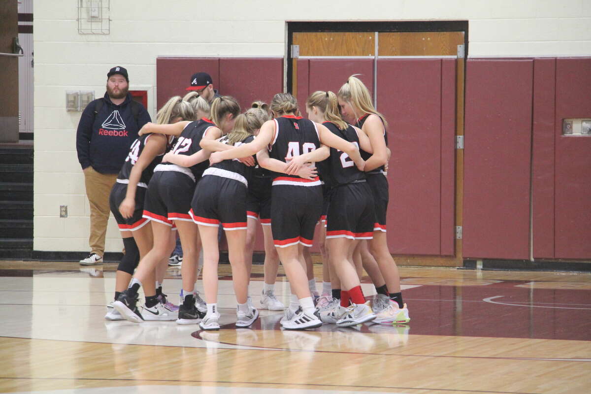 The Lady Redskins in the huddle.