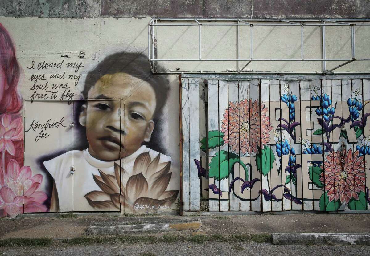 A mural shows Kendrick Lee, photographed Wednesday, Nov. 24, 2021, at the intersection of Elgin Street and Ennis Street in the Third Ward neighborhood in Houston. Officials say that Lee was beaten to death and left in an apartment with his abandoned siblings for months.