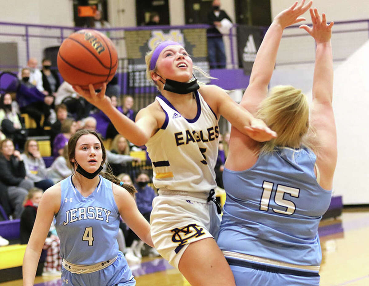 CM's Kelbie Zupan (3) shoots over Jersey's Carly Daniels (15) while the Panthers' Avery Reeder watches the play Monday in a CM Class 3A Regional semifinal in Bethalto.