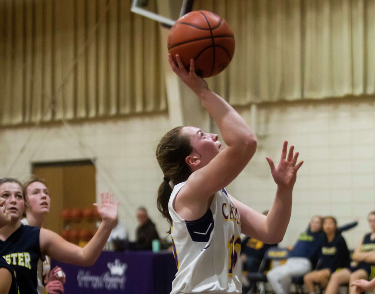 Calvary Baptist's Caitlyn Dickerson takes a shot during a game against Rochester Hills Christian Friday, Feb. 11, 2022 at Calvary Baptist Academy.