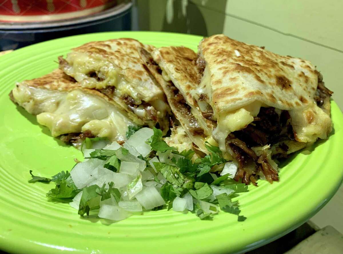 Alison Cook Cobo’s Que brisket boudin macandcheese quesadilla is
