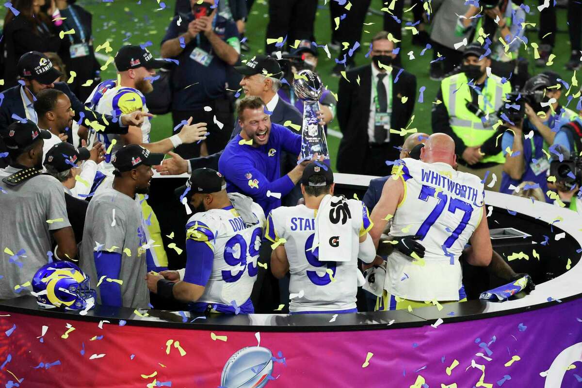 Los Angeles Rams head coach Sean McVay holds the Lombardi Trophy after defeating the Cincinnati Bengals, 23-20, in Super Bowl LVI at SoFi Stadium on Sunday, Feb. 13, 2022, in Inglewood, California. An average of about 112 million people watched the game, which was broadcast by Stamford-based NBC Sports.