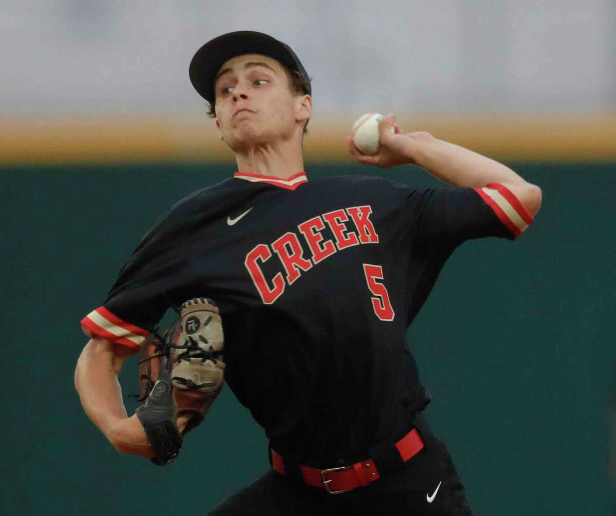 Caney Creek starting pitcher Gage Miertschin (5) throws during the first inning of a District 20-5A high school baseball game at Lake Creek High School, Tuesday, April 27, 2021, in Montgomery.