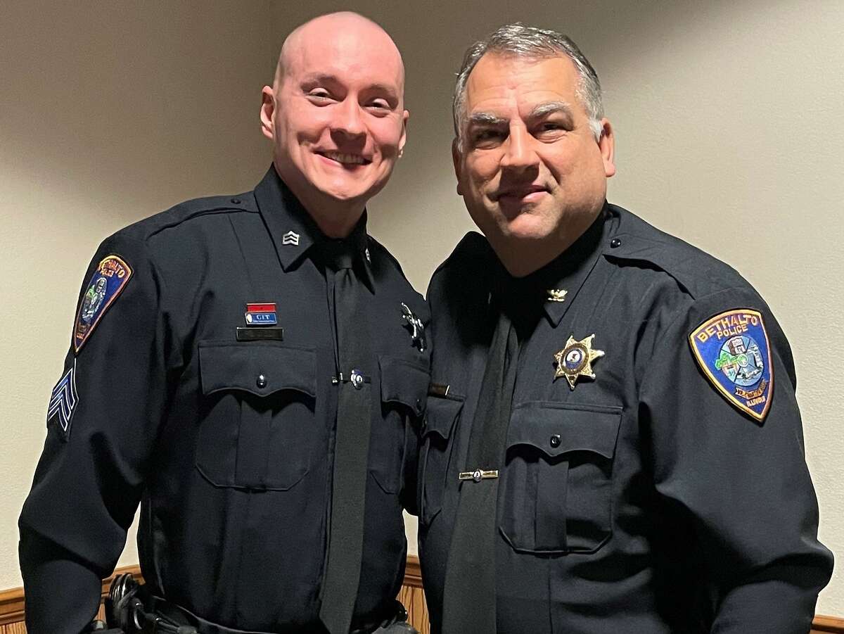 Bethalto Sgt. Jordan Lind, left, was officially pinned for his new rank this week, by Bethalto Police Chief Mike Dixon.