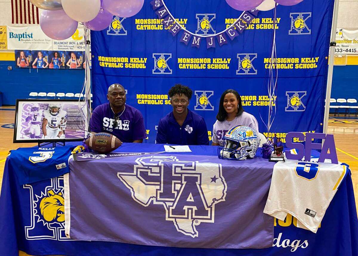 Kelly Catholic running back signs with SFA football during a ceremony on Tuesday in Beaumont.